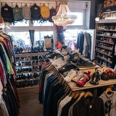 shop with racks and vintage clothing