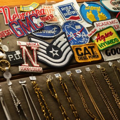 display with vintage patches jewelry